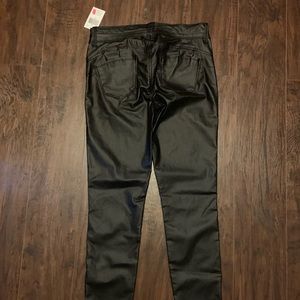 Mid rise faux leather skinny jeans
